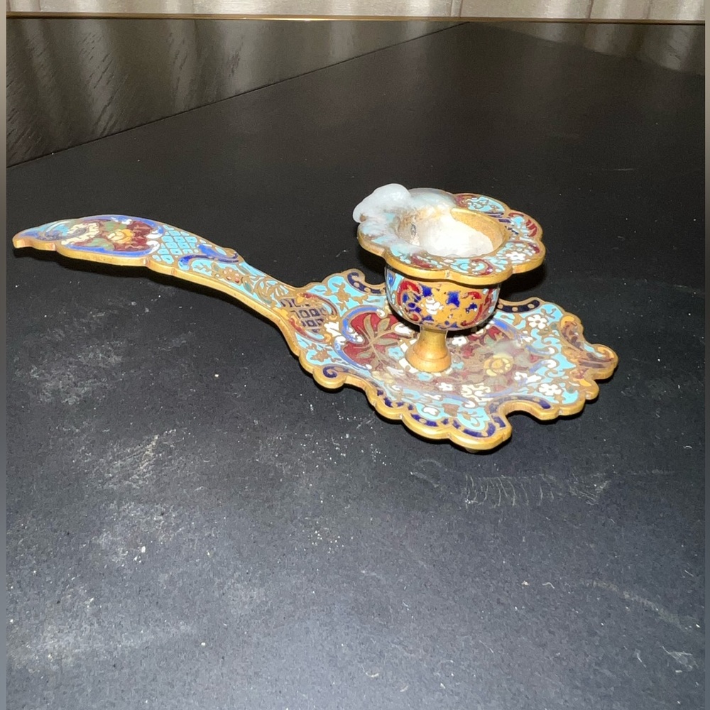 Antique bronze an enamel candle holder.